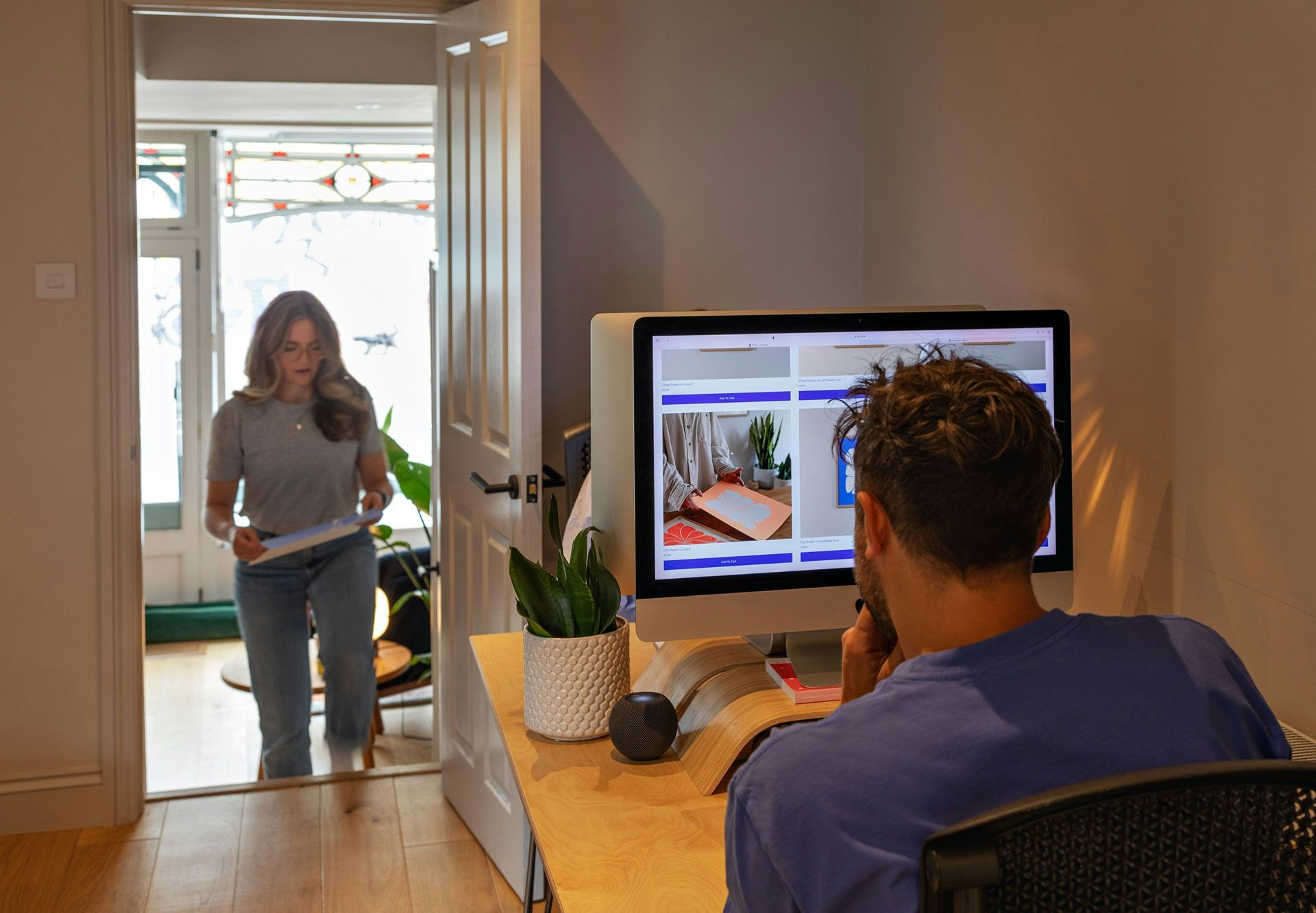 Studio Floc working at a computer in Bristol